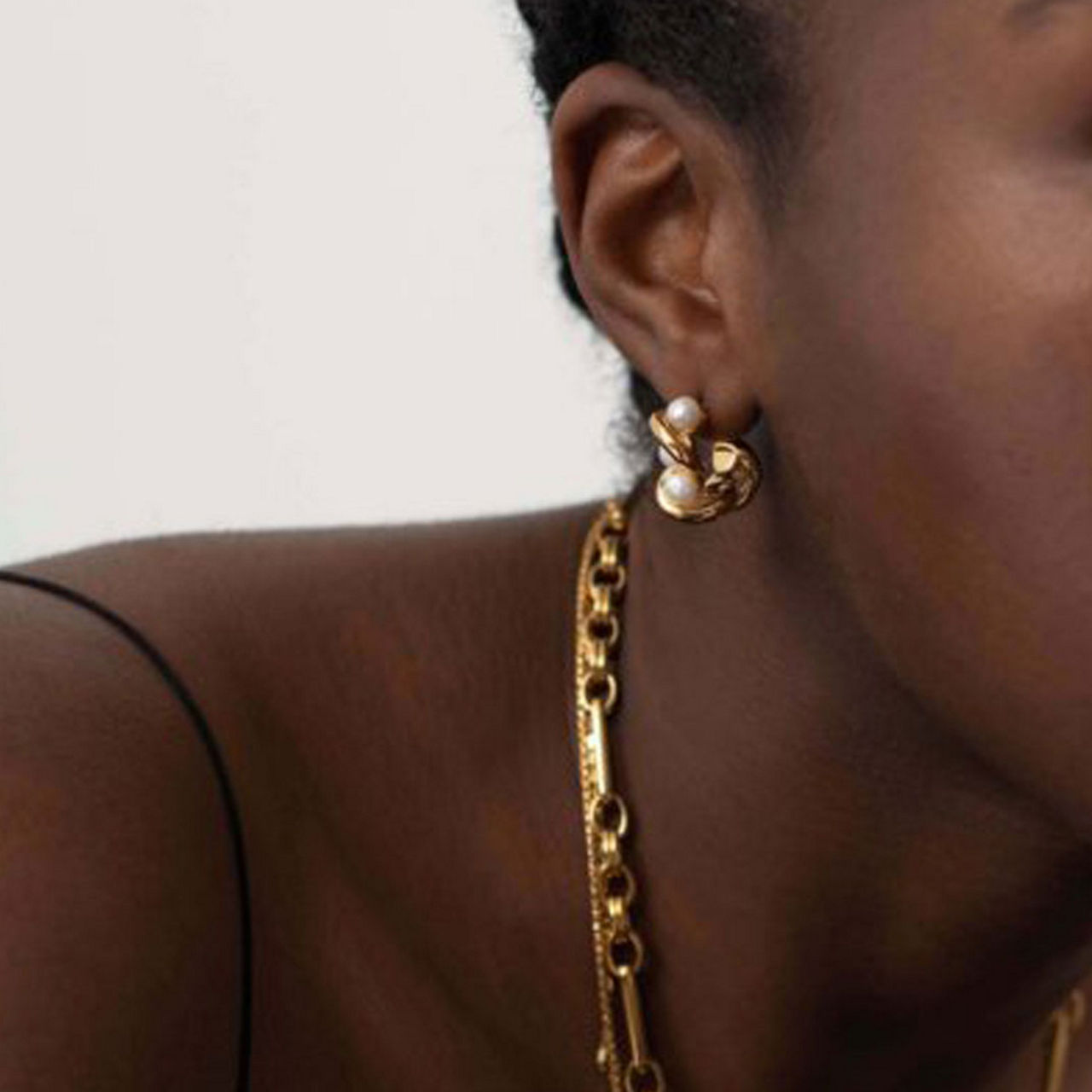 Molten Pearl Twisted Mini Double Hoop Earrings Molten Pearl Twisted Mini Double Hoop Earrings